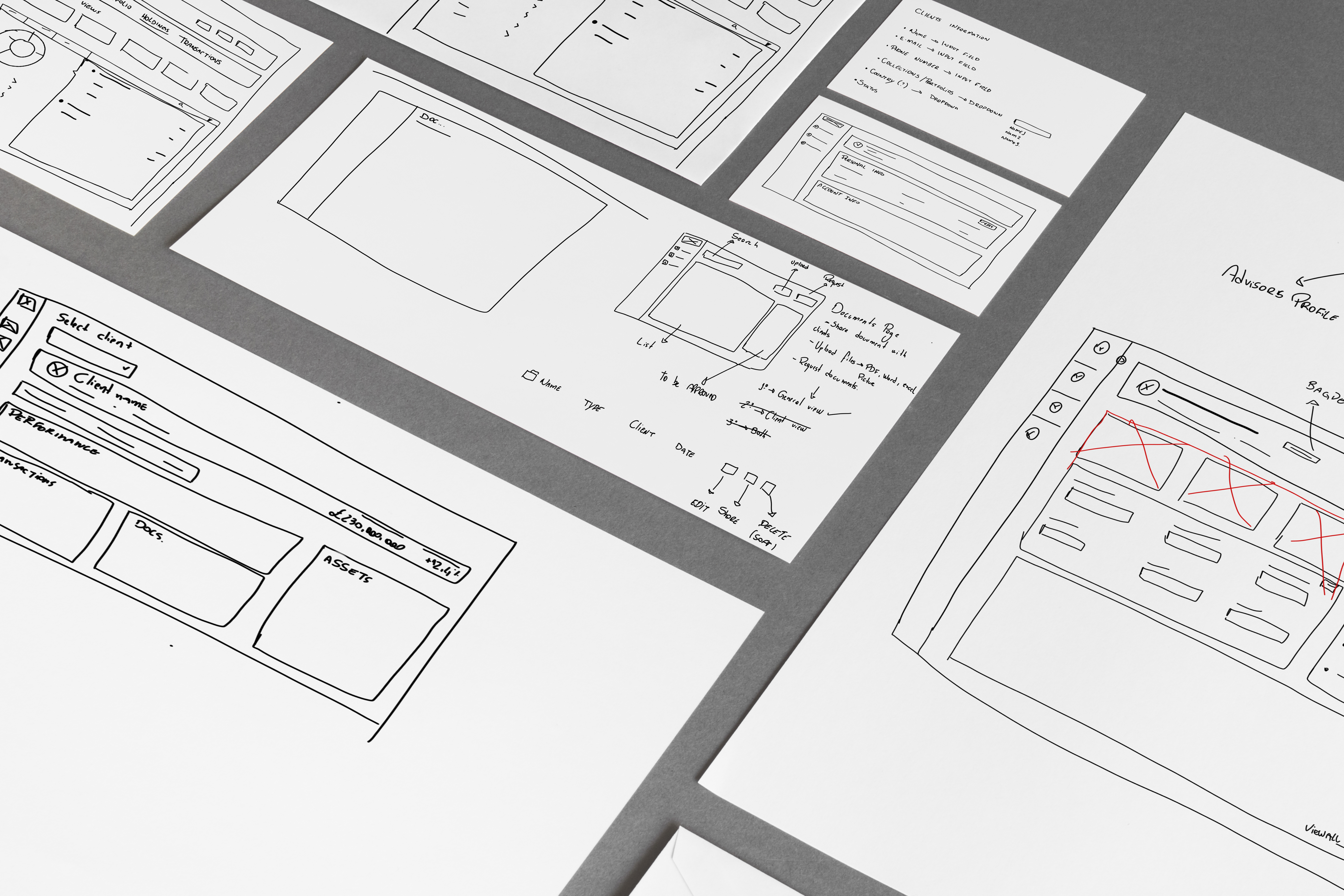 Hand-drawn wireframes laying out the initial screen structure and user flow concepts